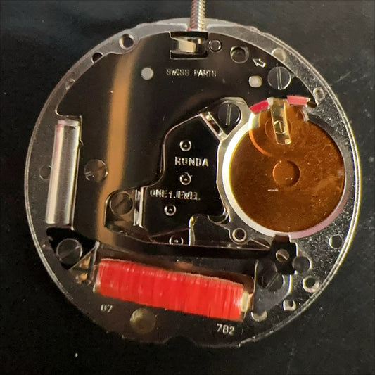 Swiss Part Silver Ronda 782 quartz watch movement with 2 hands, no calendar, for precise timekeeping.