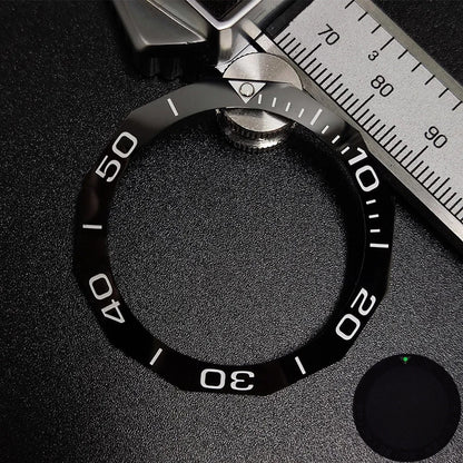 Sloping luminous ceramic bezel insert 42.3x33.3mm for automatic watch replacement, precise fit and durability.