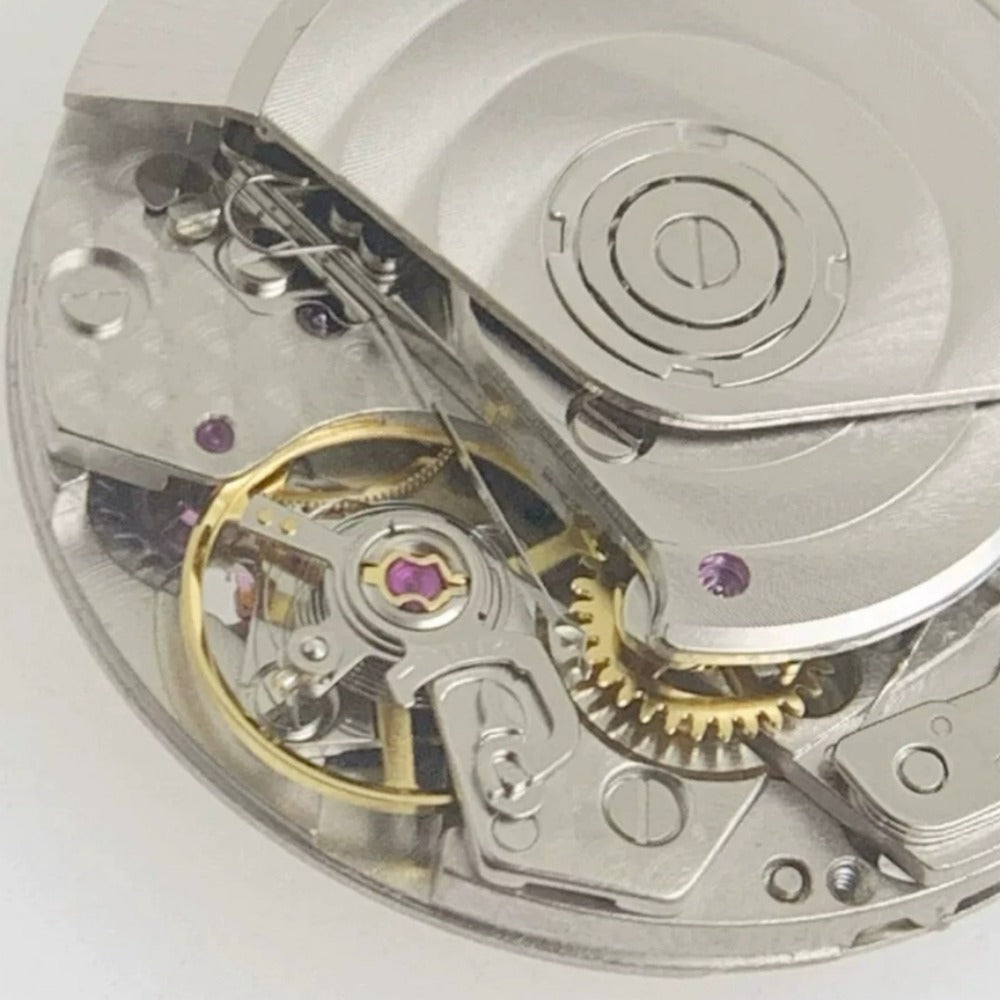 Chinese Dandong 7750 mechanical watch movement with 5 hands and ultra-thin small second at 6 o'clock.