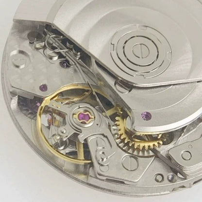 Chinese Dandong 7750 mechanical watch movement with 5 hands and ultra-thin small second at 6 o'clock.