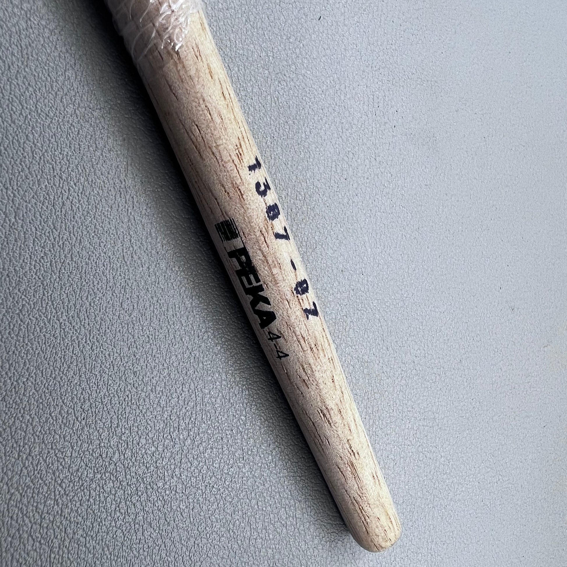 Swiss Bergeon 1307-02 white bristle brush for delicate watch cleaning and maintenance.