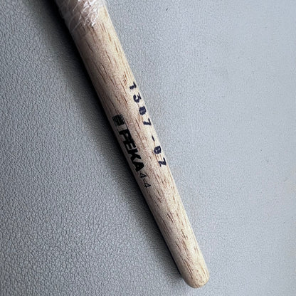 Swiss Bergeon 1307-02 white bristle brush for delicate watch cleaning and maintenance.