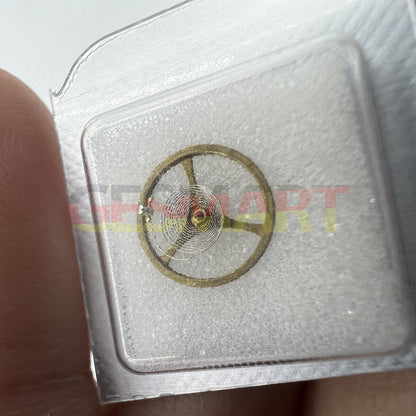 Golden balance wheel with hairspring for Movement 2189 watch repair, precise fit spare part for accurate timekeeping.