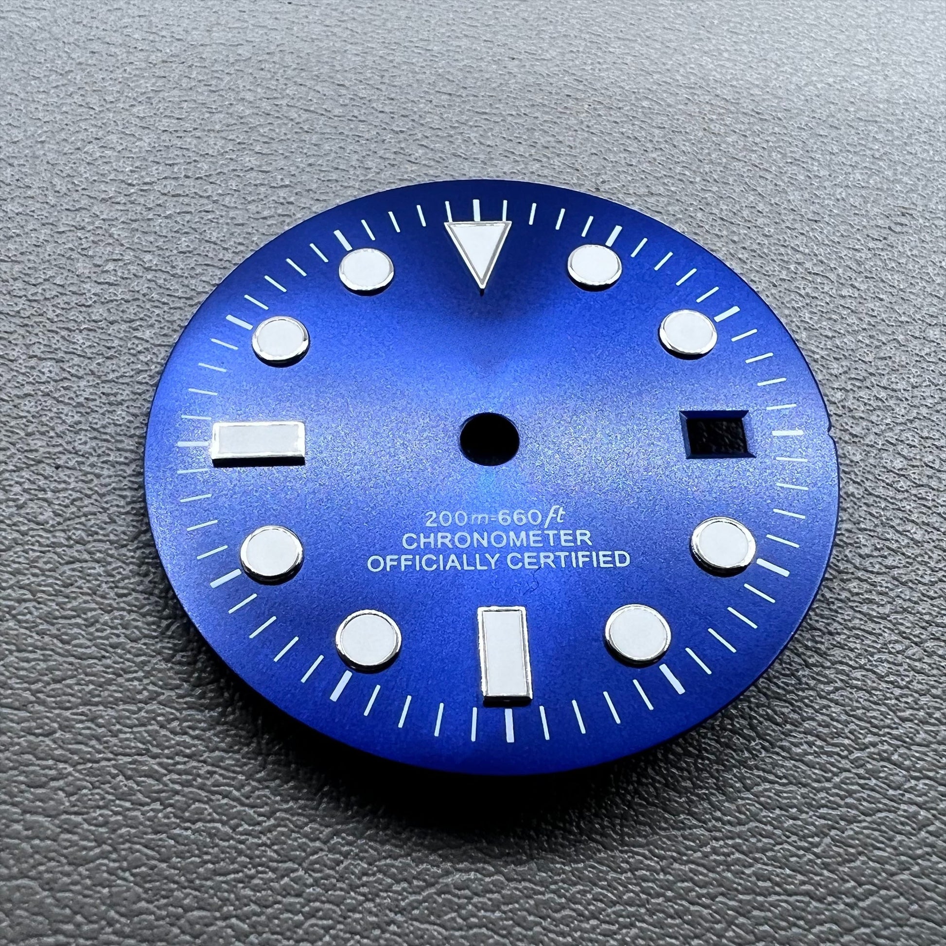 Blue 32mm GMT diving watch dial with green luminous markers for NH34 movement.