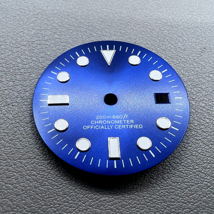 Blue 32mm GMT diving watch dial with green luminous markers for NH34 movement.