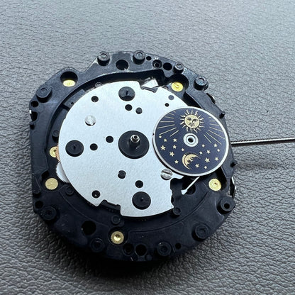 Original Japan VD59 watch movement close-up showing multifunctional quartz small second at 6/9/12 o'clock positions.