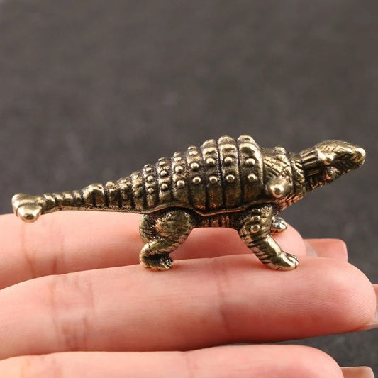 Vintage solid copper Ankylosaurus dinosaur figurine, hand-carved bronze trinket for collectors.