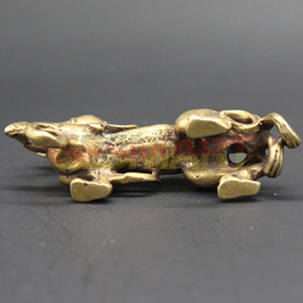 Hand-carved solid copper dragon figurine with vintage bronze finish, collectible decor.