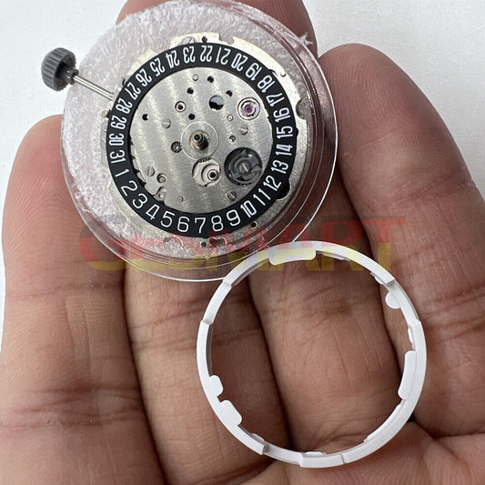 Miyota Citizen 8215 watch movement with black dial and date at 6, Japanese automatic mechanical design