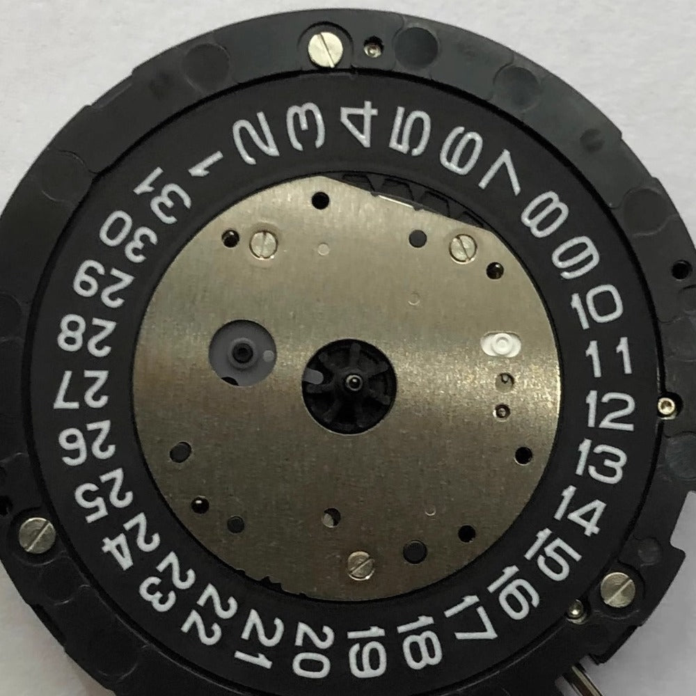 Black disk date watch part with Miyota 6S10 quartz movement, ideal for precision repairs.