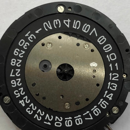 Black disk date watch part with Miyota 6S10 quartz movement, ideal for precision repairs.