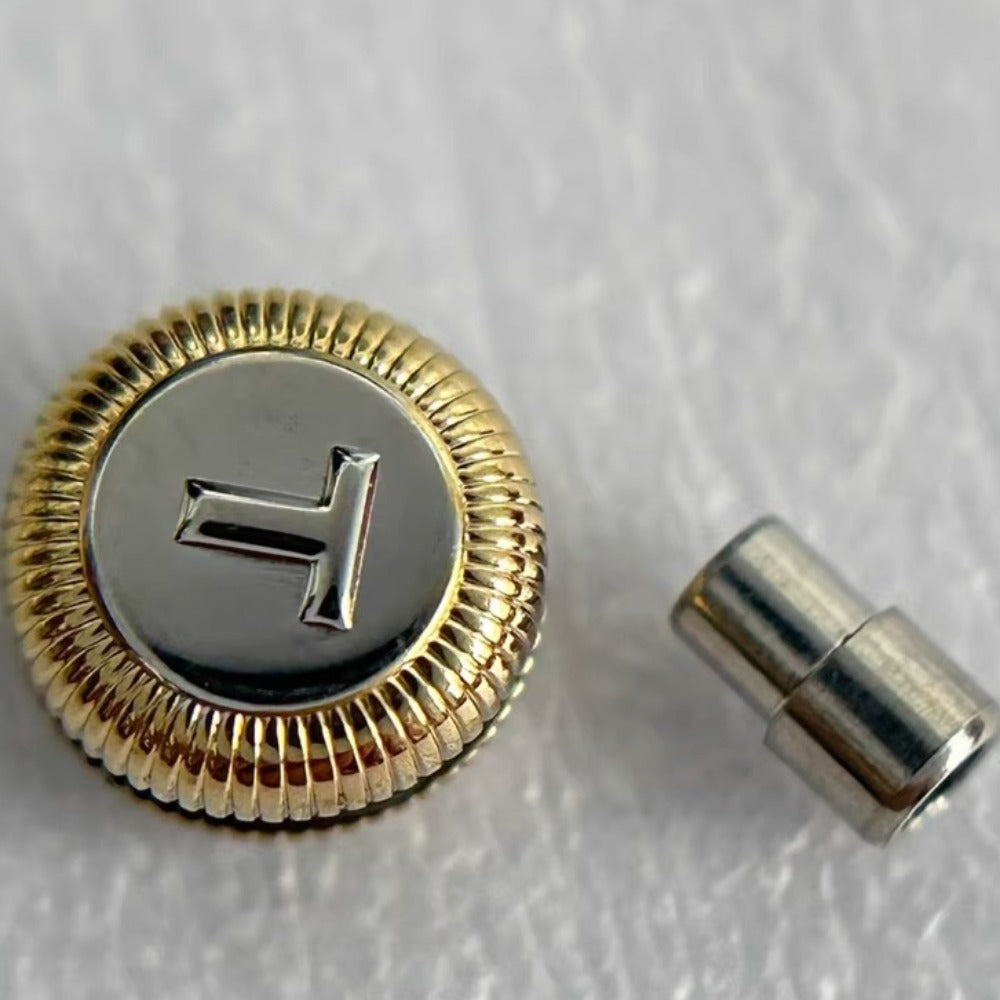 Steel golden small watch crown for Tissot T097, precise repair part enhancing vintage watch functionality.