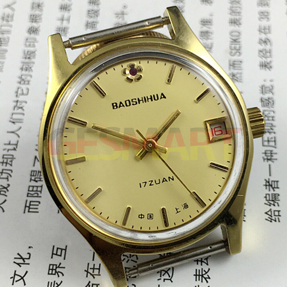 33mm manual mechanical watch with yellow dial, single calendar, 17 jewels, shock-resistant design.