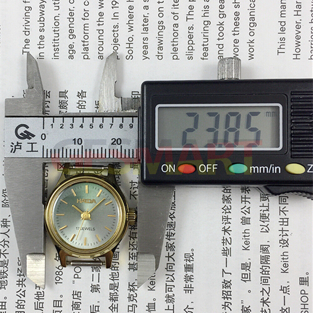 23mm SHANGHAI HAIDA ladies watch with golden nail markers and black-green dial for elegant style.