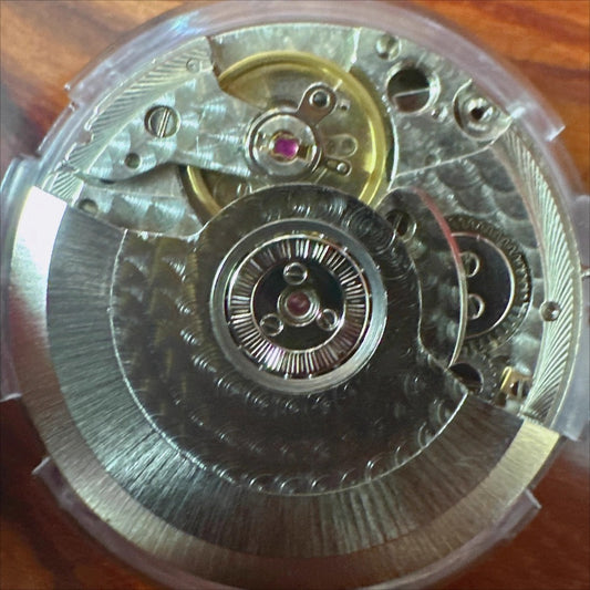 Seagull ST2557 GMT watch movement with yellow font, mechanical 3-hand design from Tianjin factory.