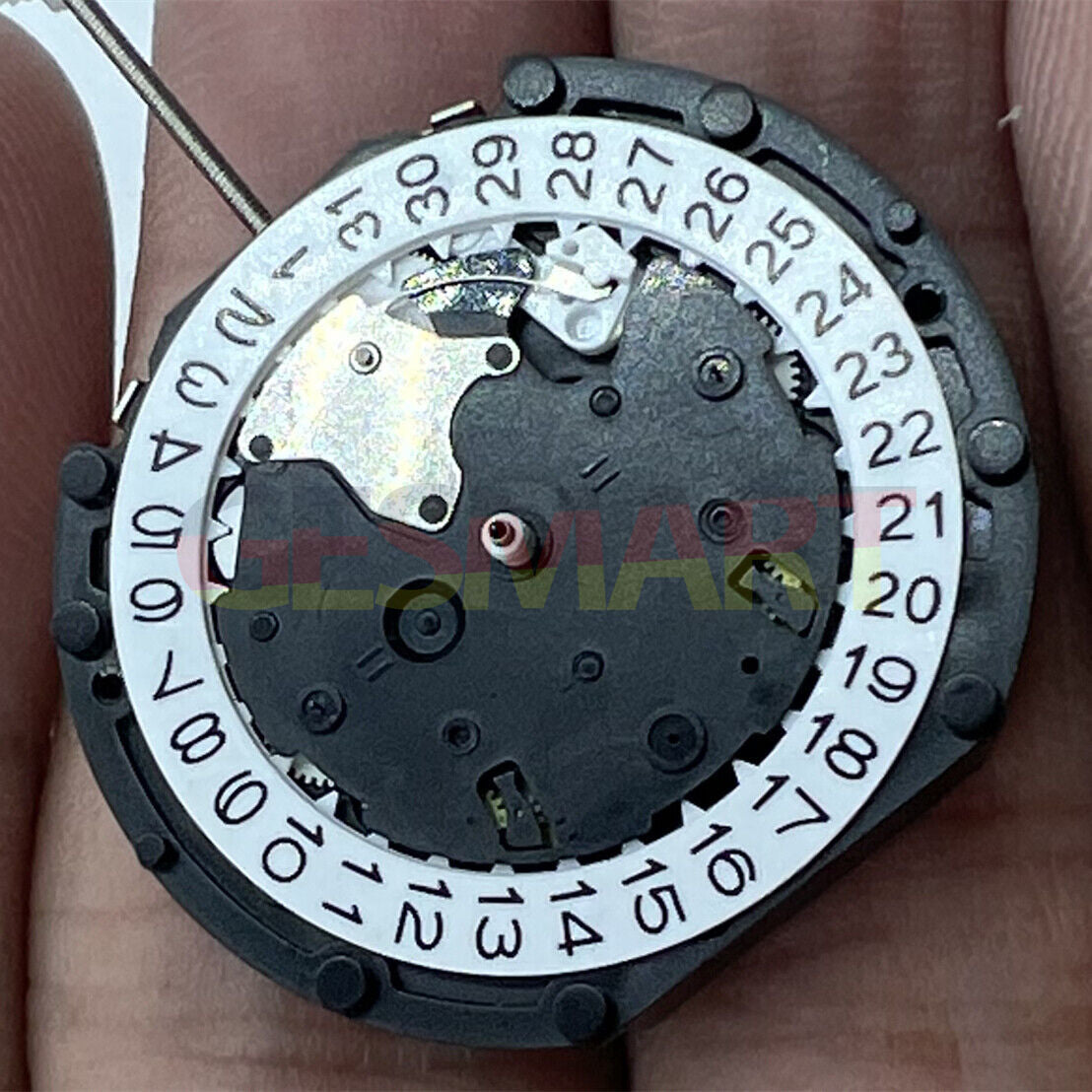 Sunon PE90 quartz watch movement with 3 hands, date at 3, small seconds at 6 and 12.
