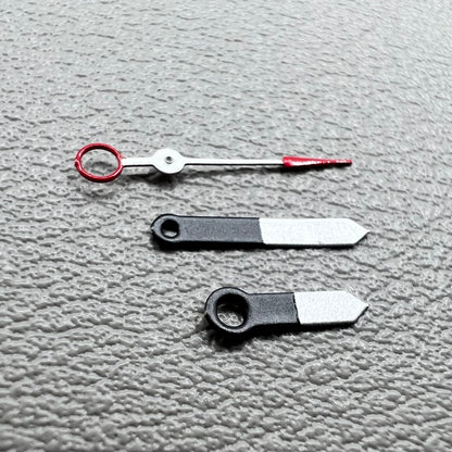 Set of black and white painted trim arrow-shaped watch hands without lume for Ronda 515, ideal for precise timekeeping.
