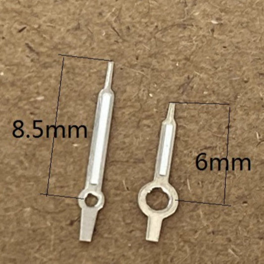 Silver-trimmed green lume watch hands for Ronda 763, 762, 751, 1062, 1063 movements