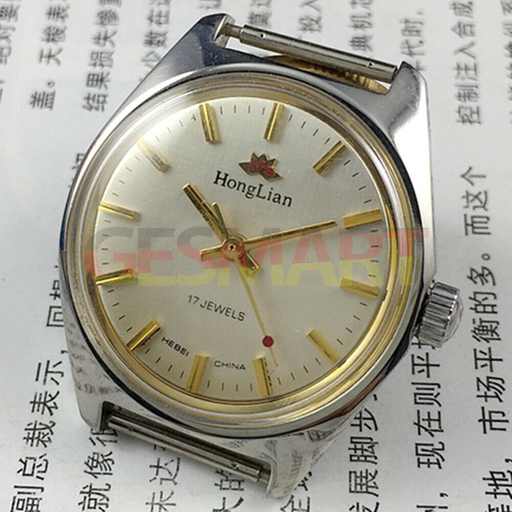 HONGLIAN 32mm manual mechanical watch with 17 jewels, golden nail markers, and grey dial for elegant style.