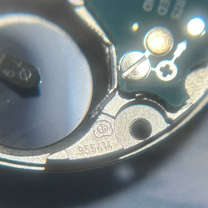 Swiss Made ETA 956.414 quartz watch movement with date and 3 hands, reliable precision for watch repairs.