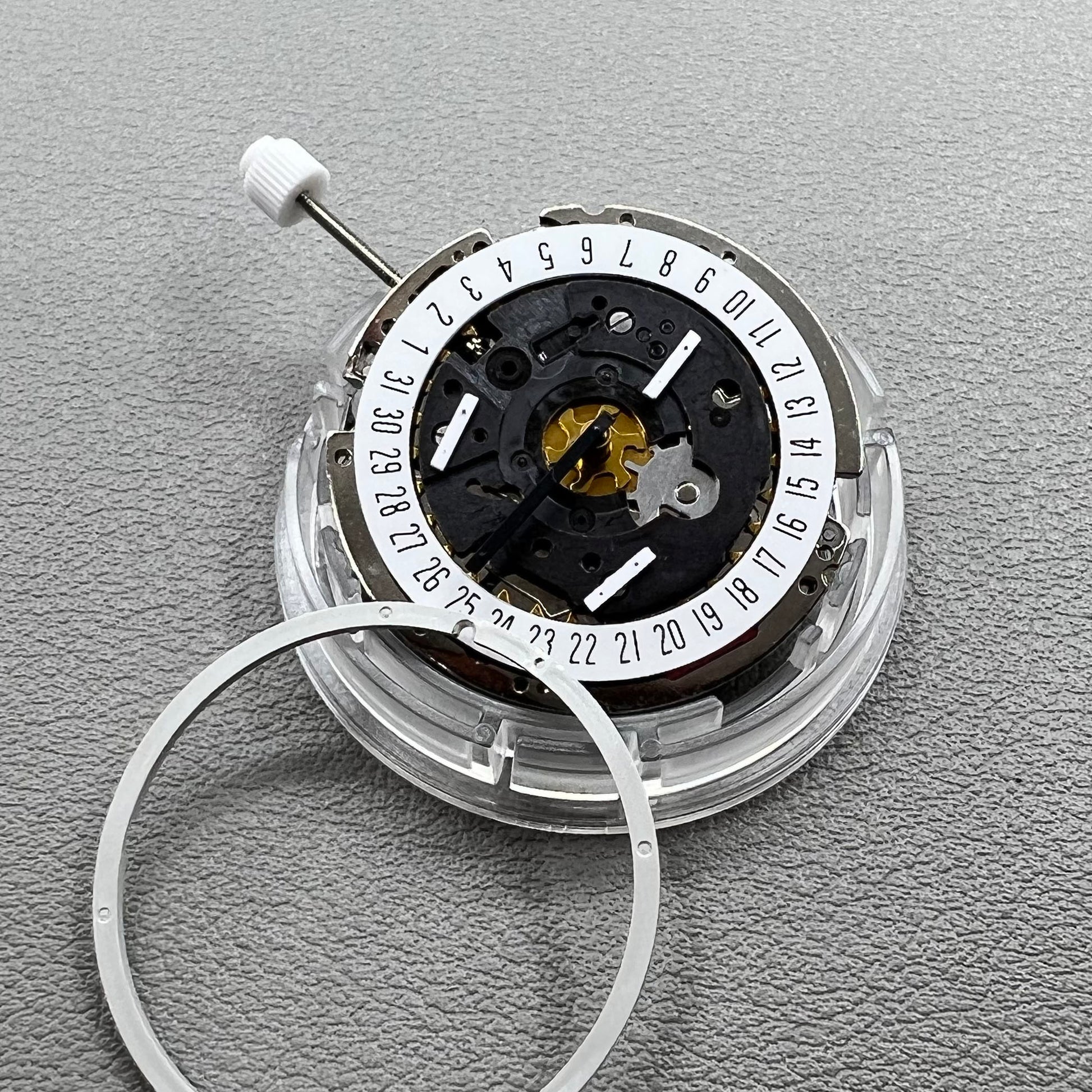 Swiss ISA 8172 Date@6 quartz watch movement replacement by ISA, precise timekeeping for watch repairs.