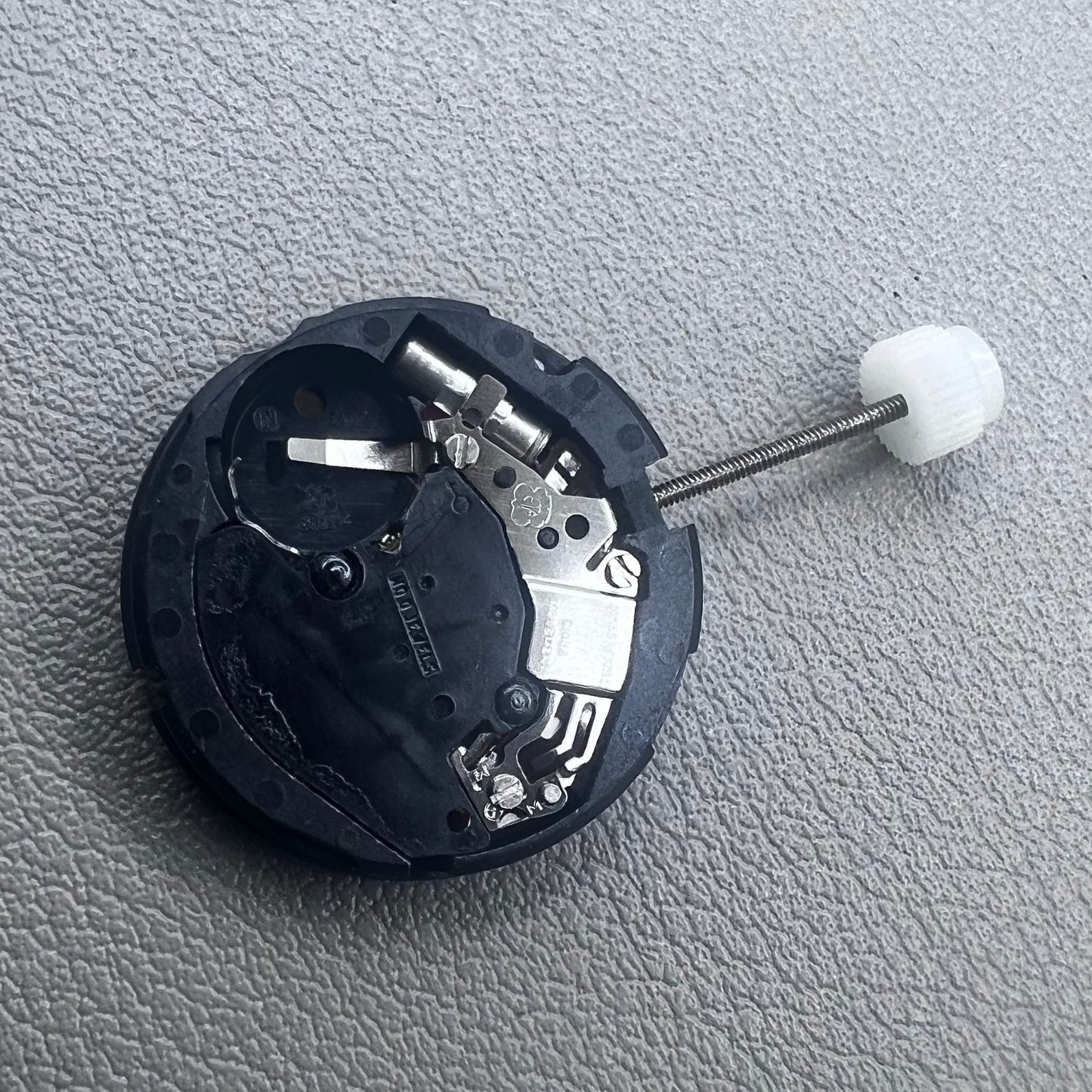 Swiss ETA 803.112 quartz watch movement with 3 hands and date window at 3 o'clock by ETA.