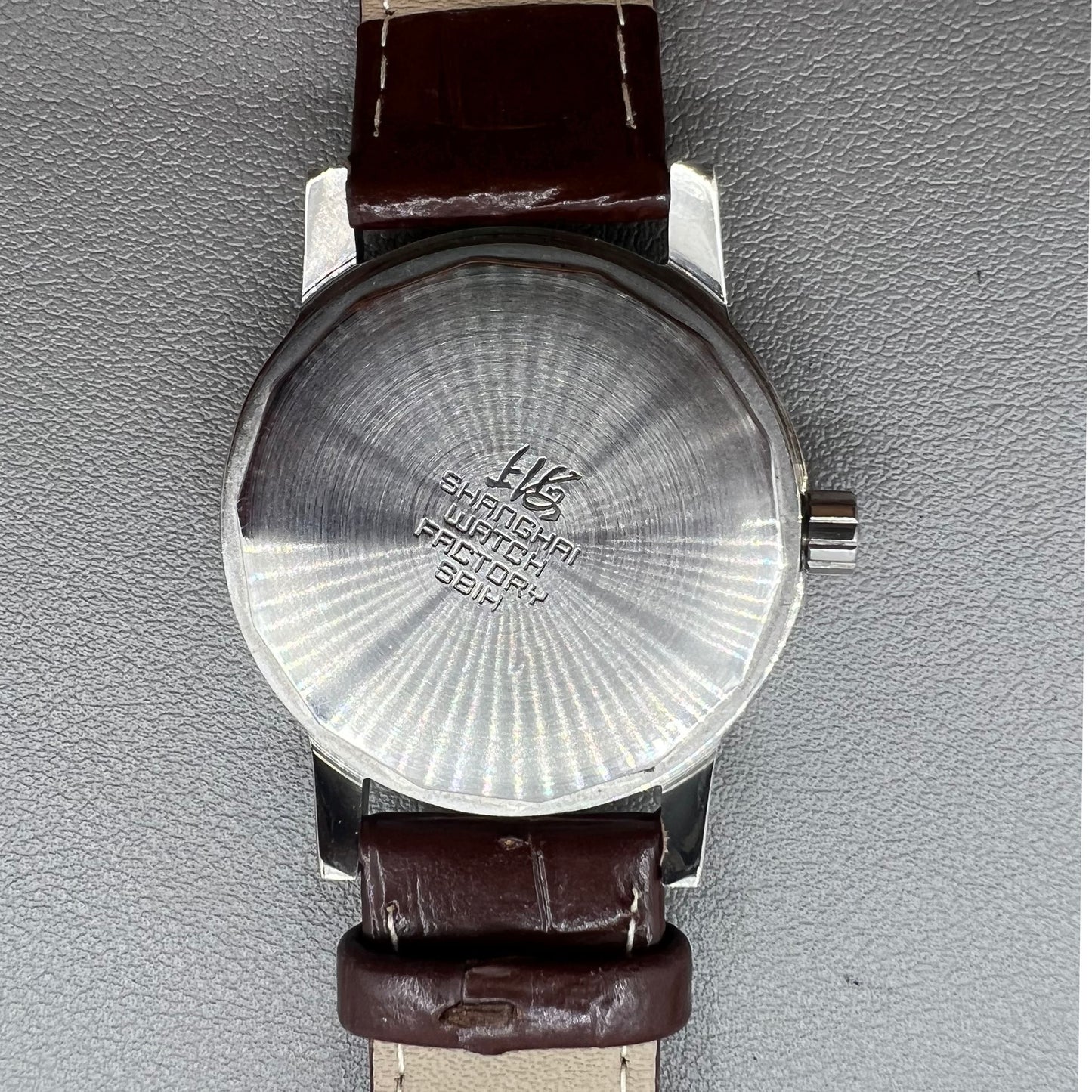 Shanghai 36mm 8120 manual mechanical watch with white dial, brown strap, 17 jewels precision craftsmanship.
