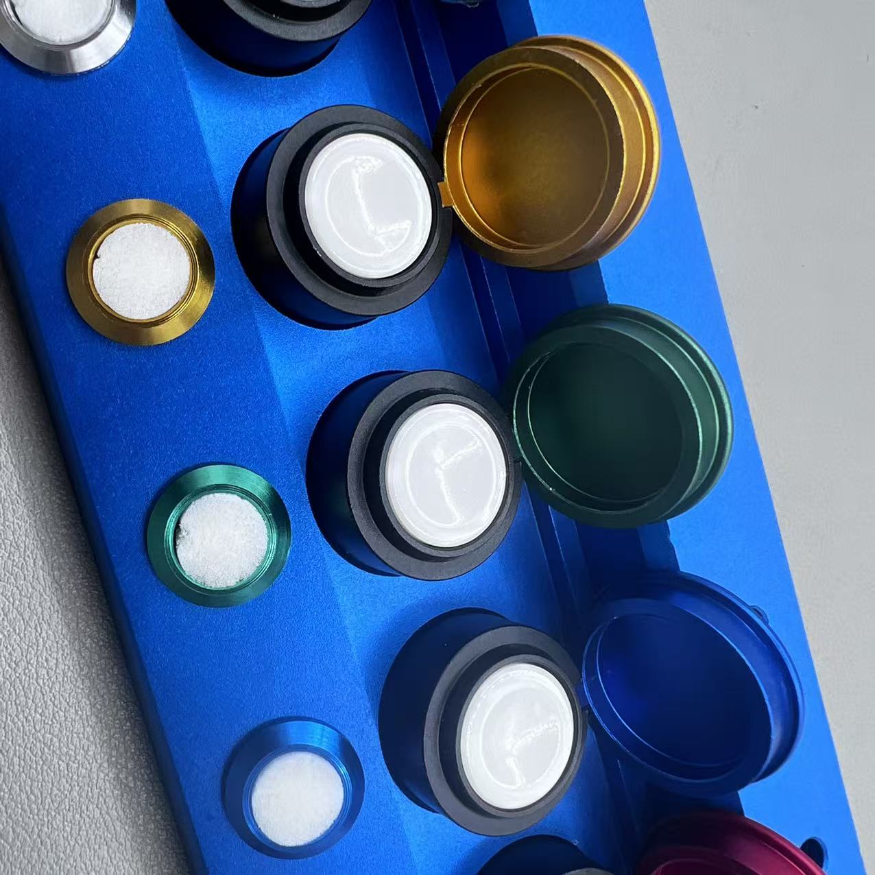 Die-cast alloy 5-container oil cup stand for watch repair accessories.