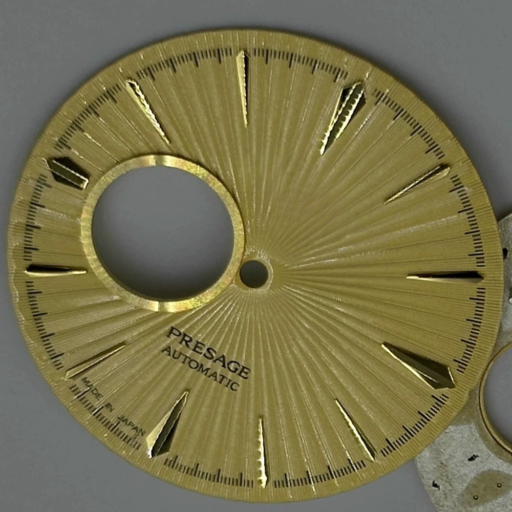 Golden 35mm cocktail watch dial with NH39 movement cutout, classic design by Modified brand.