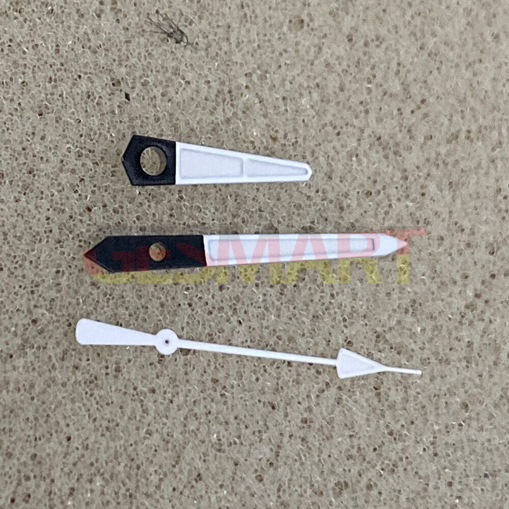 White arrow-shaped watch hands with black trim and green luminous fill for NH35/NH36 movement, enhancing visibility.