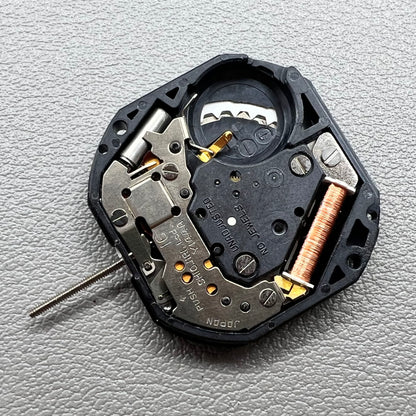YL44A Quartz watch movement with double calendar and 3 hands, branded for precise timekeeping.
