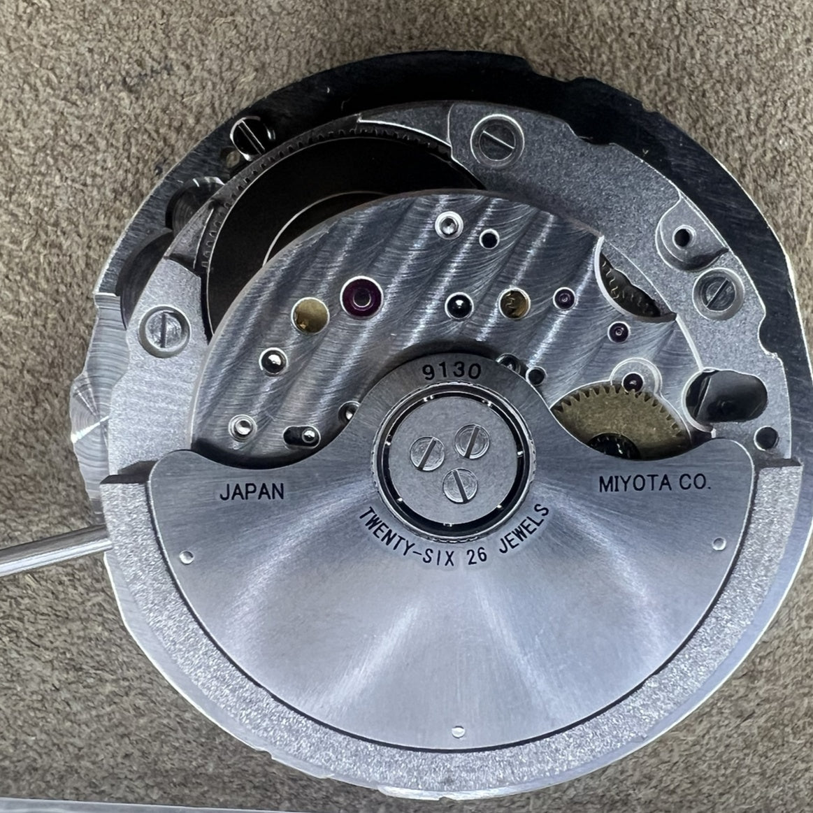 Miyota 9130 automatic watch movement showing date at 6 o?clock, precision mechanical part