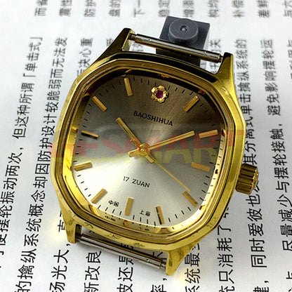 32mm Shanghai manual mechanical watch with golden nails and brown dial in octagonal case.