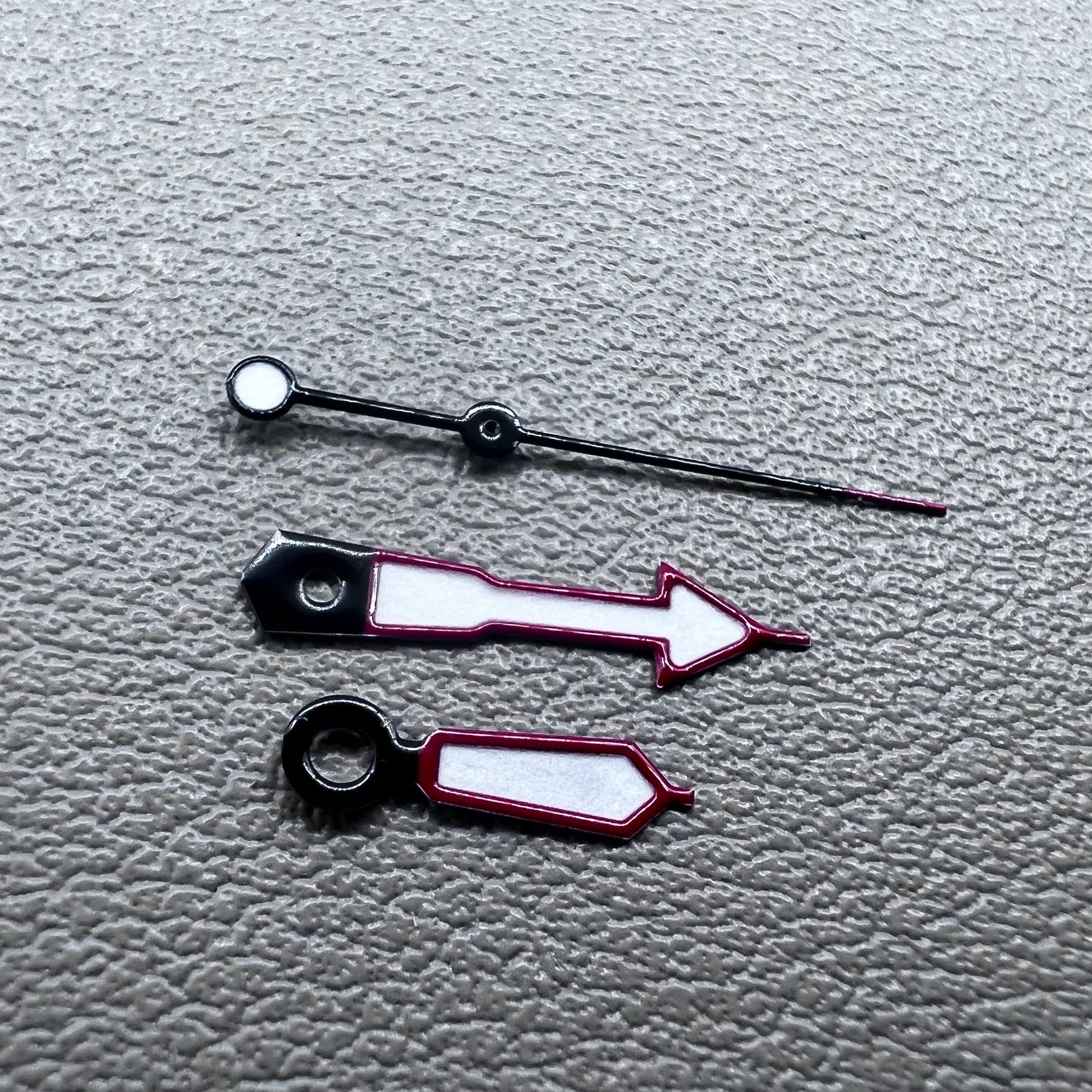 Green lume arrow-shaped watch hands with red trim, compatible with NH35 NH36 movements,.