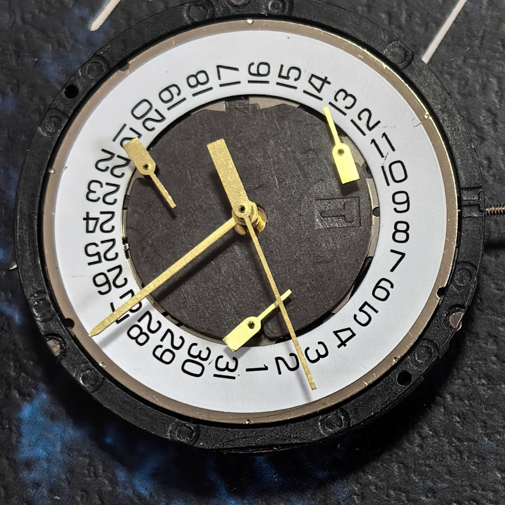 Swiss ETA G10.711 quartz watch movement with 6 hands, date at 4, for precise timekeeping.