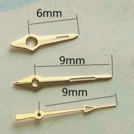 Golden trim arrow-shaped green lume watch hands for Miyota 2035, ideal for precise time reading.