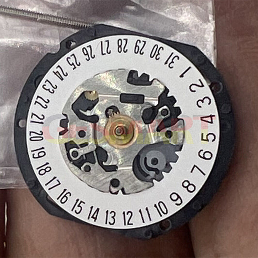 Hattori Epson TMI VX19 Quartz watch movement with date at 6, Japan made for precise timekeeping