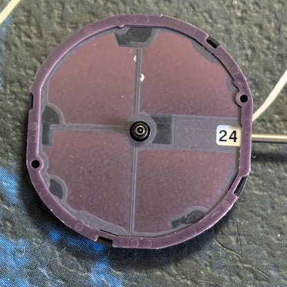 Citizen Eco-Drive E013M quartz watch movement with solar power and date display at 3 o'clock.