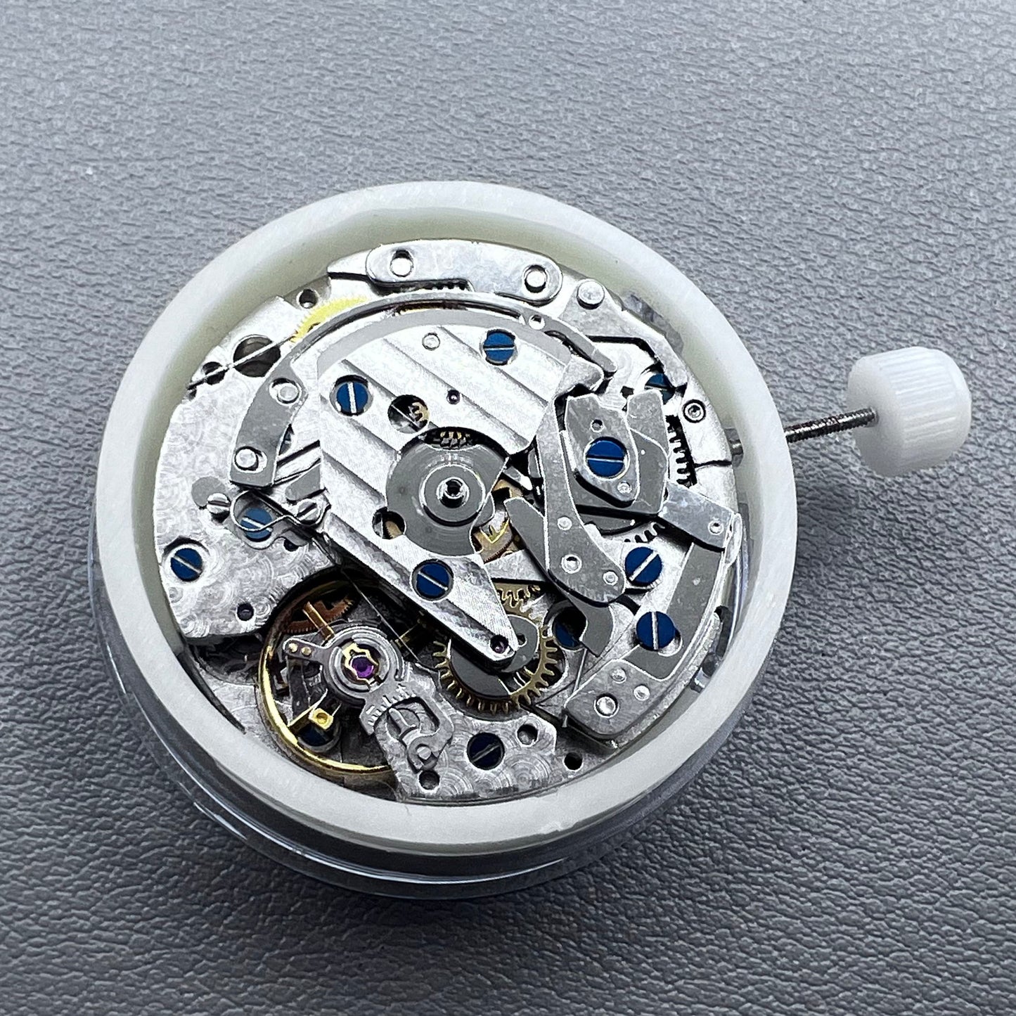 Close-up of Chinese 7750 automatic chronograph movement with day date at 3, ETA 7750 style mechanism