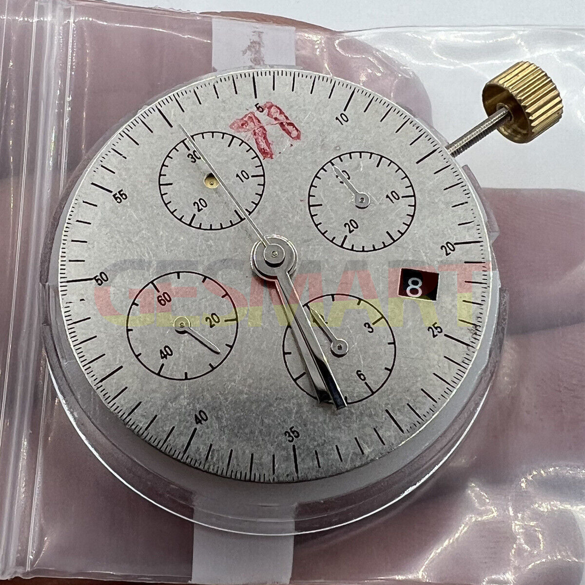 Black Dandong 7753 automatic watch with small second at 9, precise mechanical movement, China made.