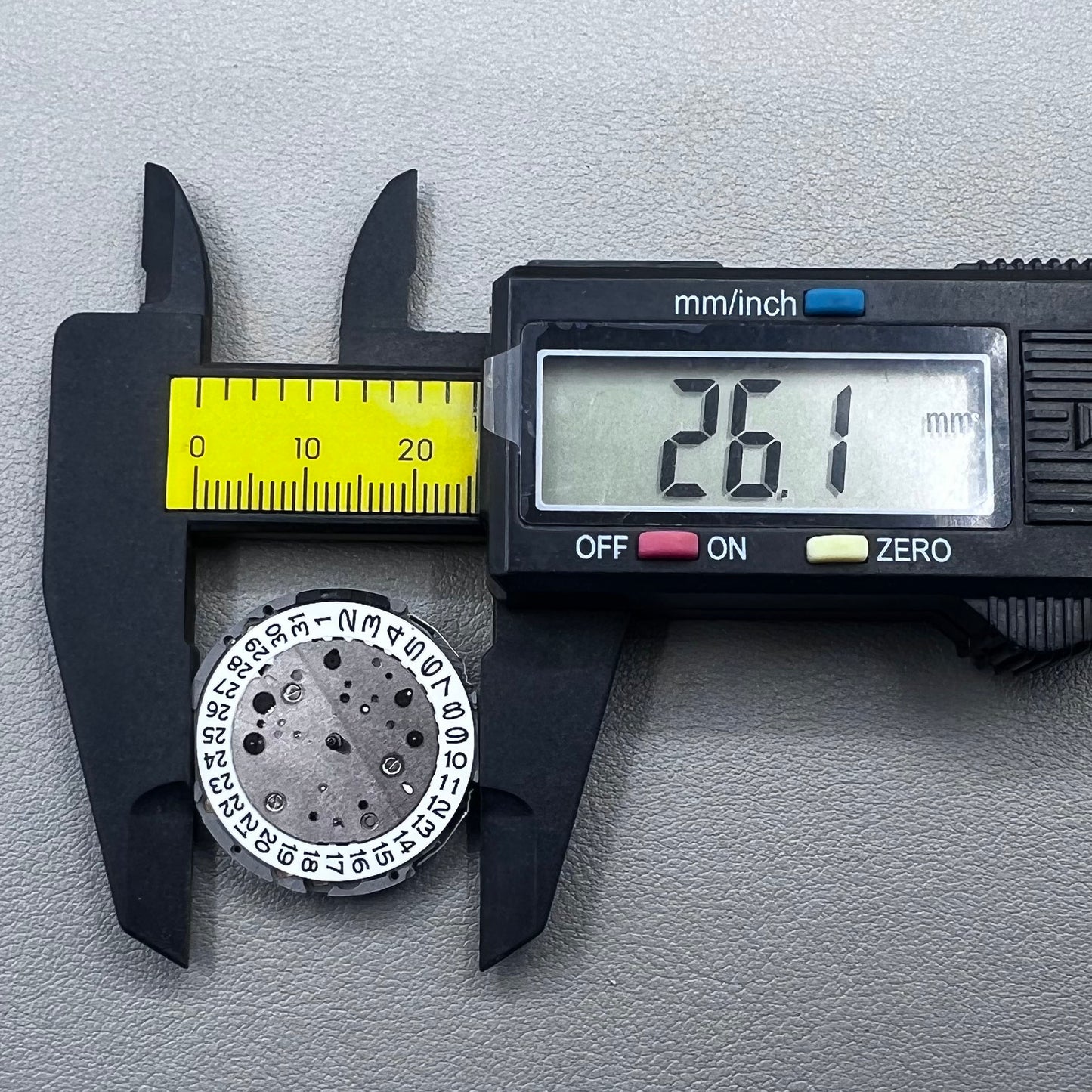 Japan Miyota JS26 watch quartz movement with date at 3 o'clock and small seconds at 6 and 9 markers