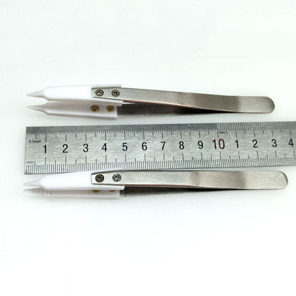 PTFE pointed tip tweezers, heatproof and chemical resistant, ideal for semiconductor lab use.