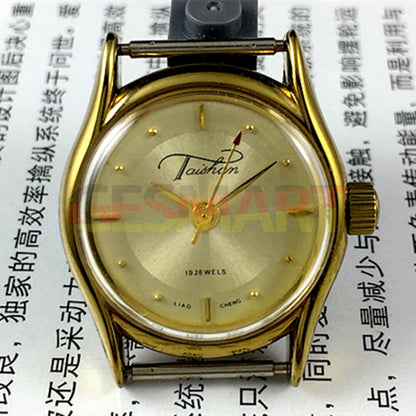 TAISHAN manual mechanical lady watch with 19 jewels, champagne dial, and golden case, elegant design.
