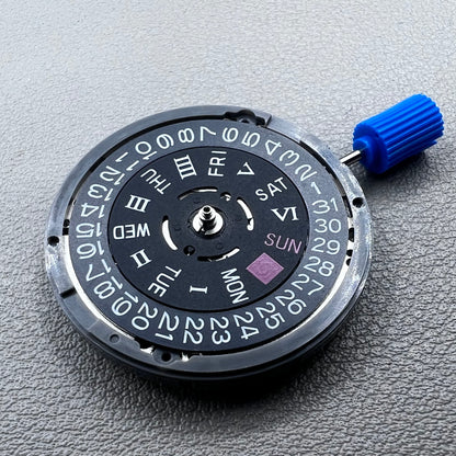 Seiko NH36A automatic movement with black Roman wheel crown, precise watch accessory for mechanical timepieces.