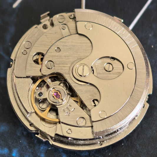 Tianjin Seagull ST16 automatic mechanical watch movement with date at 12, China-made precision.