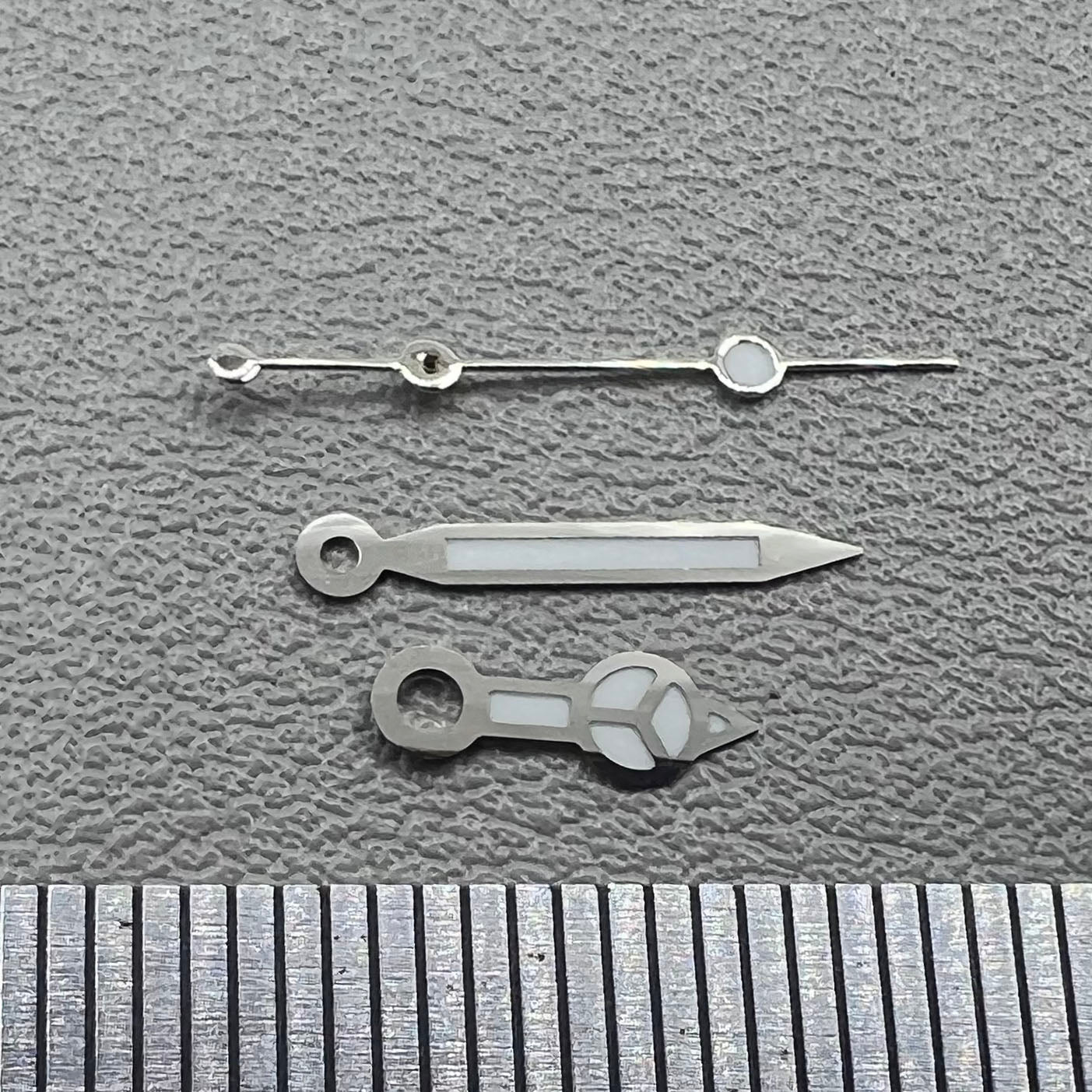 1. Silver-trimmed green lume watch hands set for NH05 NH06 movements.  
