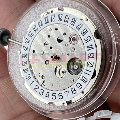 Miyota/Citizen 8215 silver plated automatic watch movement showing date at 6, precision Japanese mechanics
