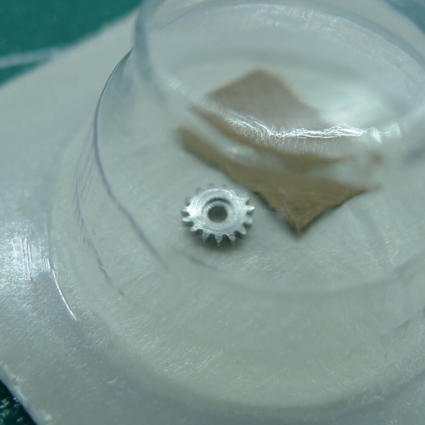 Wholesale winding pinion for 1530 1570 watch movements, generic replacement ensuring precise timekeeping accuracy.