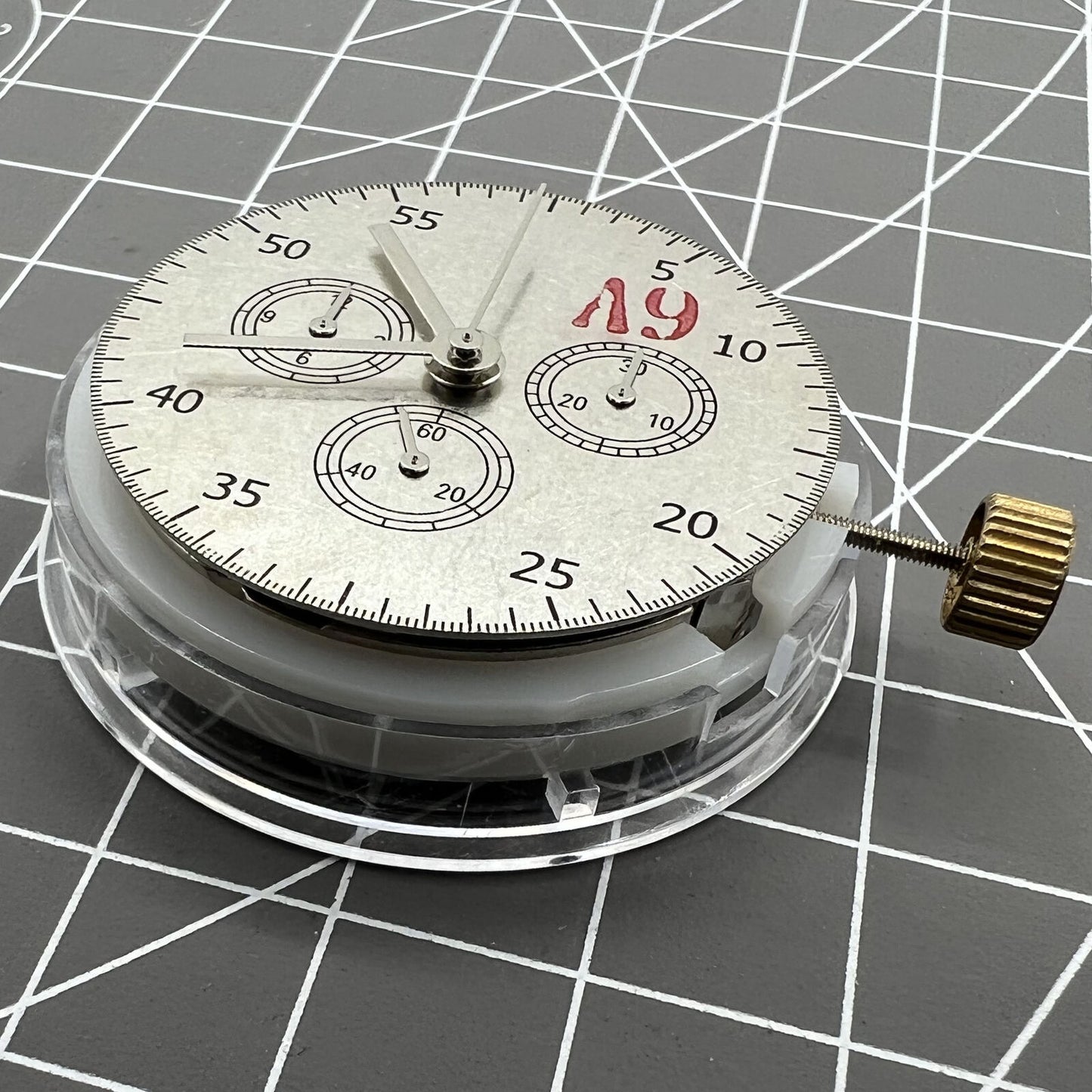 ETA Brand #7750 automatic chronograph watch movement showing detailed subdials at 3, 6, and 9 o'clock positions.