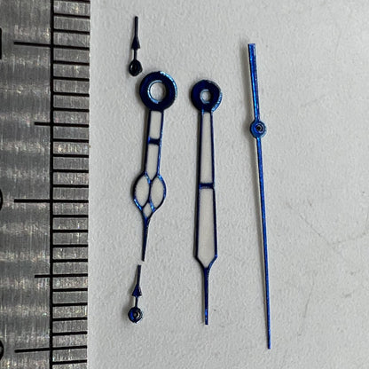 Blue trimmed watch hands with green lume for Miyota OS10 movement, precise fit and luminous glow.